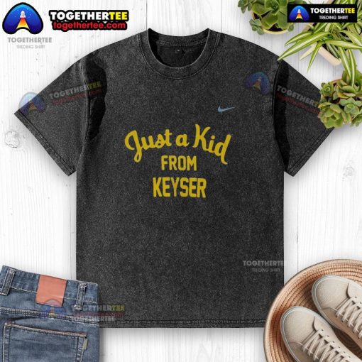 Alt Text: Official West Virginia Mountaineers 'Just A Kid From Keyser' washed t-shirt, featuring vibrant team colors and logo.