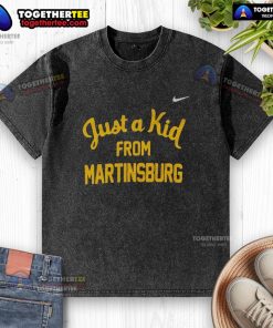 Official West Virginia Mountaineers 'Just A Kid From Martinsburg' washed t-shirt showcasing team pride and local spirit.
