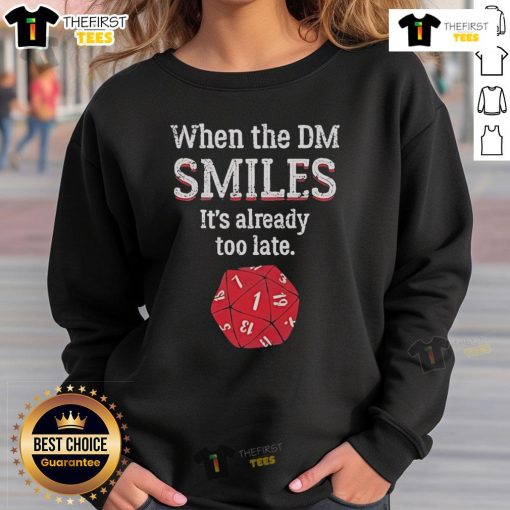 Alt Text: Official When The DM Smiles It's Already Too Late Sweatshirt in black, featuring bold text design on a cozy fabric.