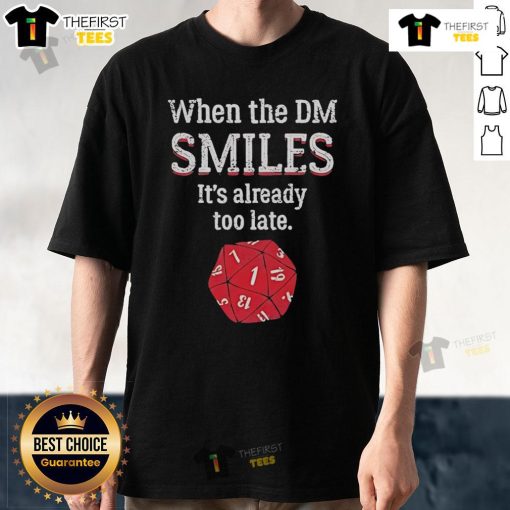 Alt Text: Official When The DM Smiles It's Already Too Late T-Shirt featuring a playful design perfect for tabletop gamers.