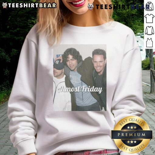 Alt Text: Official Young Entourage Almost Friday Sweatshirt in cozy fabric, perfect for casual outings and relaxed weekends.