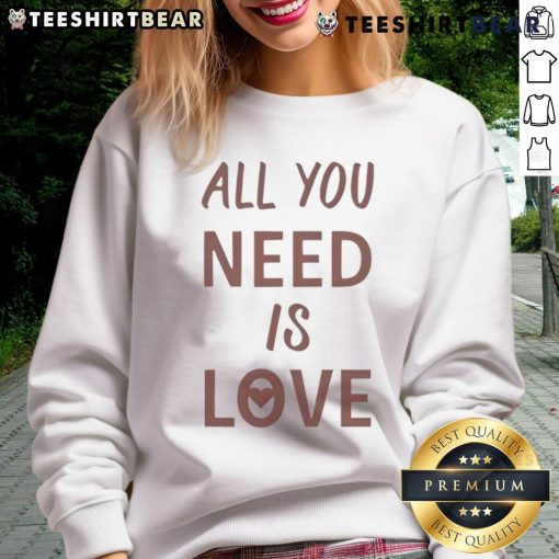 Cozy 'All You Need Is Love' sweatshirt in original design, perfect for casual wear and spreading love this season.