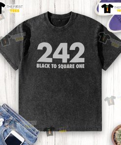 Alt Text: Original Black To Square One Washed T-Shirt displayed on a wooden background, showcasing its soft fabric and stylish design.