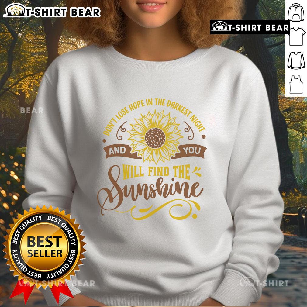 Original Don't Lose Hope In The Darkest Night And You'll Find The Sunshine Sweatshirt Original Don't Lose Hope In The Darkest Night Sweatshirt showcasing an inspiring quote on a cozy, stylish design.