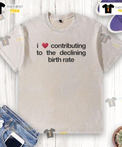 Original 'I Love Contributing to the Declining Birth Rate' washed t-shirt displayed on a wooden background.