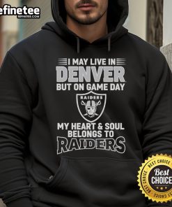 Denver fan wearing a Las Vegas Raiders hoodie, showcasing team pride on game day with vibrant colors and logo.