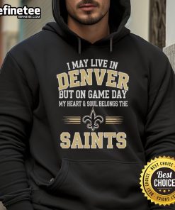 Denver fan in New Orleans Saints hoodie, showcasing team spirit on game day with vibrant colors and bold logo.