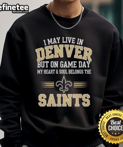Denver resident wearing New Orleans Saints sweatshirt, showcasing team pride on game day.