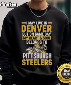 Denver resident wearing a Pittsburgh Steelers sweatshirt on game day, showcasing team spirit and loyalty.
