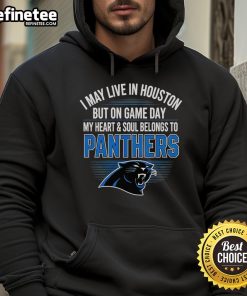 Alt Text: Woman wearing a Carolina Panthers hoodie, showing team spirit on gameday, despite living in Houston.