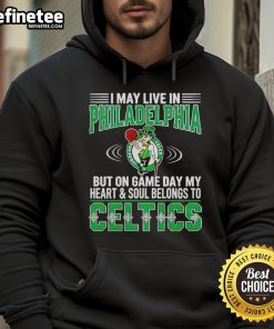 Person wearing a Boston Celtics hoodie, showcasing pride for the team despite living in Philadelphia on game day.