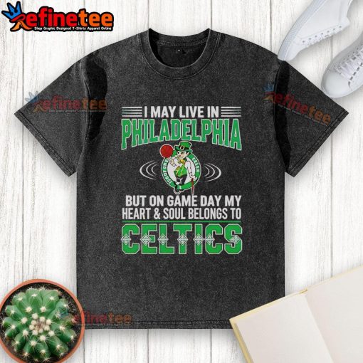 Alt Text: Washed t-shirt featuring the phrase 'I May Live In Philadelphia But My Heart Belongs To Boston Celtics'.