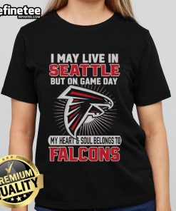 Atlanta Falcons ladies tee: 'I may live in Seattle, but my heart belongs to the Falcons' - perfect for game day.