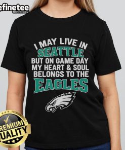 Alt Text: Original I May Live in Seattle but My Heart Belongs to Philadelphia Eagles Ladies Tee, perfect for game day.