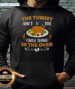 Alt Text: Original Turkey Ain't The Only Thing In The Oven Hoodie featuring a fun graphic design for holiday apparel.