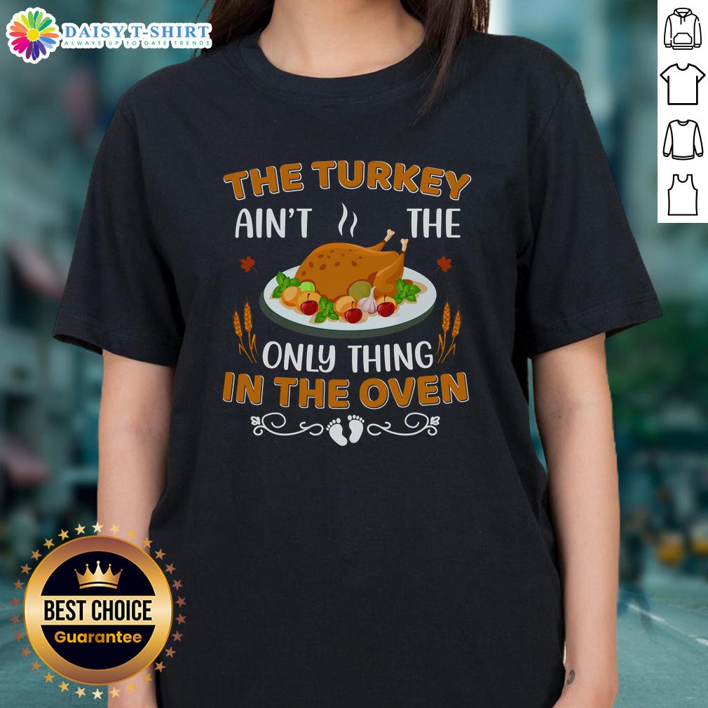 Original The Turkey Ain'T The Only Thing In The Oven Ladies Tee Original Turkey Ain't The Only Thing In The Oven Ladies Tee featuring a fun Thanksgiving design for festive wear.