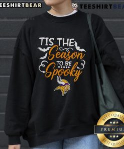 Cozy Minnesota Vikings sweatshirt for Halloween, featuring 'Tis The Season To Be Spooky' design in team colors.