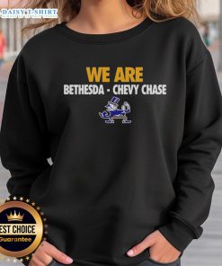 Original We Are Bethesda Chevy Chase mascot sweatshirt featuring vibrant logo and cozy design for fans.