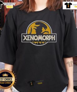 Original Xenomorph X Jurassic Park logo on a stylish ladies tee, perfect for fans of sci-fi and classic films.