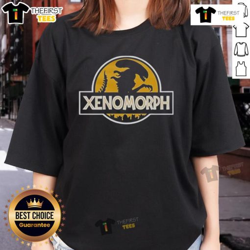 Original Xenomorph X Jurassic Park logo on a stylish ladies tee, perfect for fans of sci-fi and classic films.