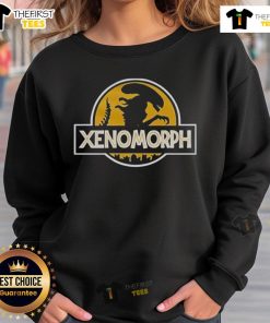 Original Xenomorph X Jurassic Park logo sweatshirt featuring a bold graphic design on a comfortable fabric.