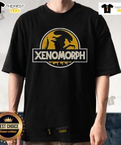 Original Xenomorph X Jurassic Park logo T-shirt featuring iconic designs from both franchises in vibrant colors.