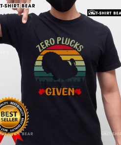 Alt Text: Original Zero Plucks Given T-Shirt featuring a bold graphic design, perfect for casual wear and expressing personality.