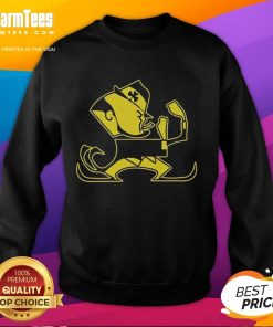 Alt Text: Premium Christopher Ash in a Notre Dame Leprechaun mascot sweatshirt, showcasing school spirit and comfort.