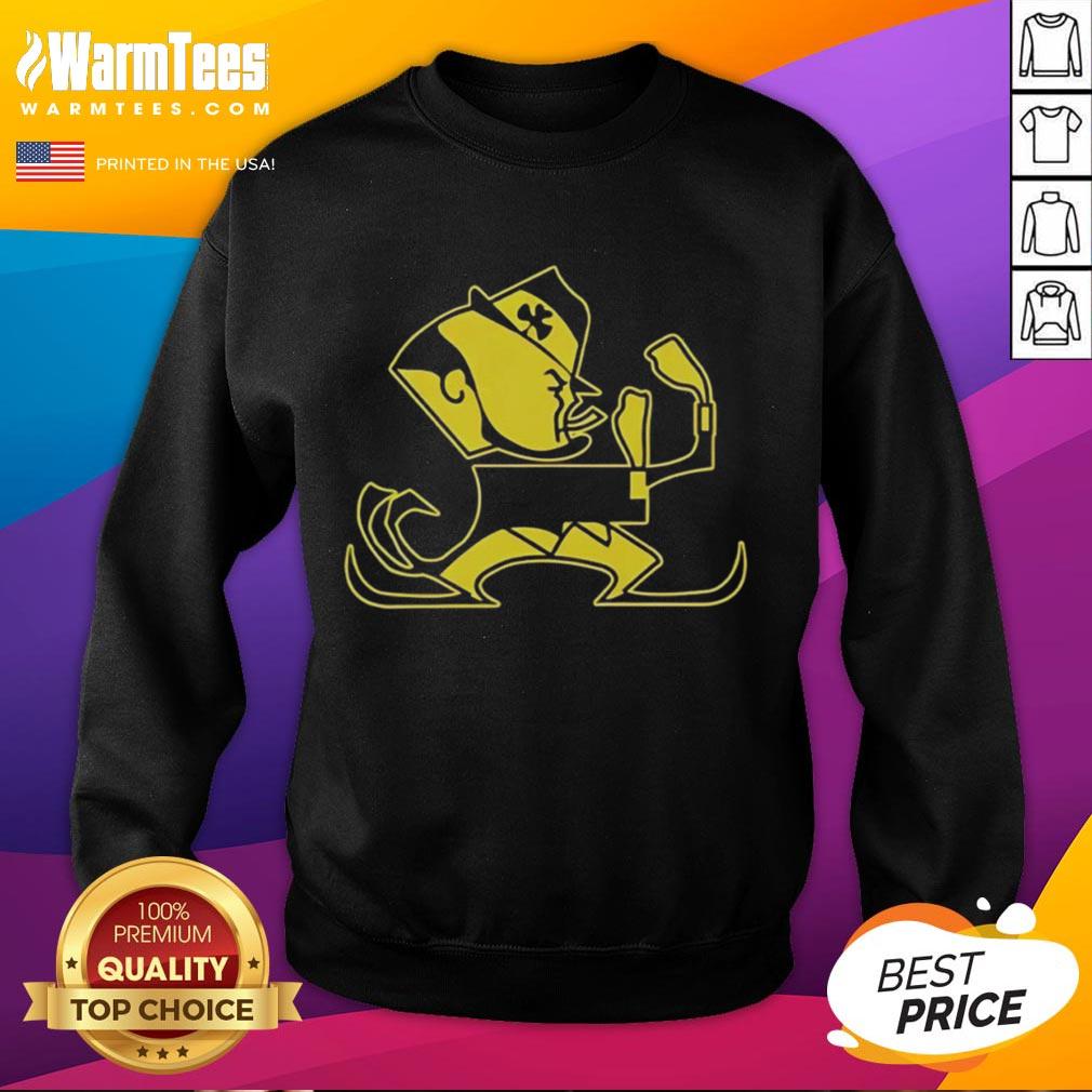 Premium Christopher Ash Wearing Notre Dame Leprechaun Mascot Sweatshirt Alt Text: Premium Christopher Ash in a Notre Dame Leprechaun mascot sweatshirt, showcasing school spirit and comfort.