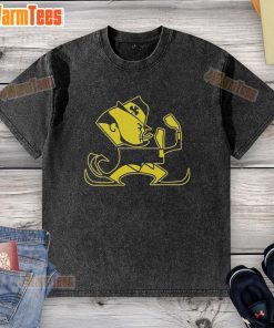 Alt Text: Premium Christopher Ash wearing a Notre Dame Leprechaun mascot washed t-shirt, showcasing school spirit and style.