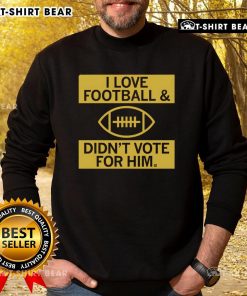 Premium I Love Football And Didn't Vote For Him Sweatshirt in cozy fabric, perfect for football fans and casual wear.
