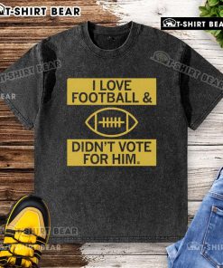 Premium I Love Football and Didn't Vote For Him washed t-shirt, perfect for football fans expressing their views.