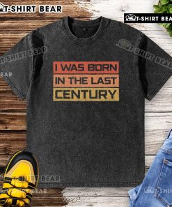 Vintage washed t-shirt featuring 'I Was Born in the Last Century' design, perfect for retro fashion enthusiasts.