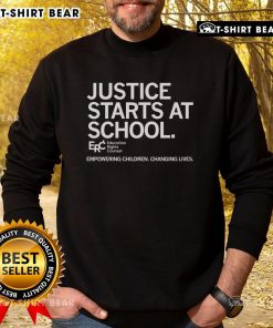 Alt Text: Premium Justice Starts At School sweatshirt empowering children and changing lives with a stylish design.