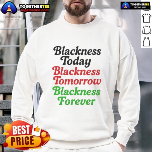 Alt Text: Premium mayor wearing 'Blackness Today, Blackness Tomorrow, Blackness Forever' sweatshirt, promoting black pride and unity.