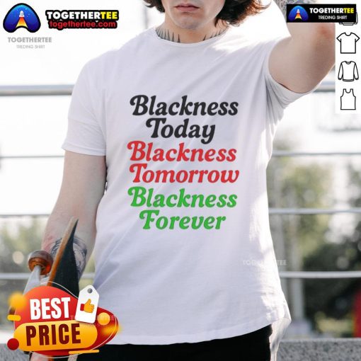 Alt Text: Premium Mayor M. Scott wearing Blackness Today, Blackness Tomorrow, Blackness Forever T-shirt in a vibrant setting.