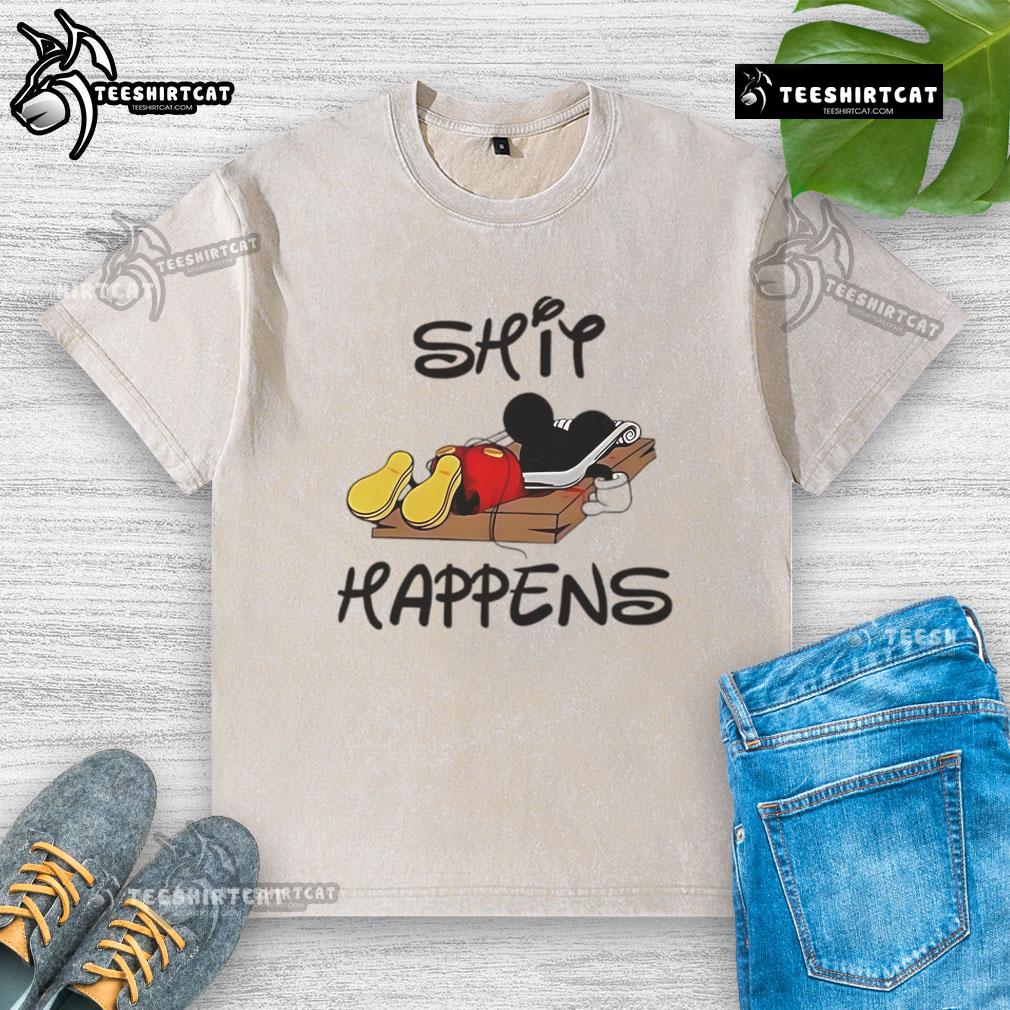Premium Mickey Mouse Shit Happens Washed T Shirt Premium Mickey Mouse Shit Happens Washed T-Shirt featuring a playful graphic design in a casual style.