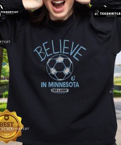Alt Text: Premium Minnesota United FC Homage sweatshirt featuring Ted Lasso's Believe design for MLS fans.
