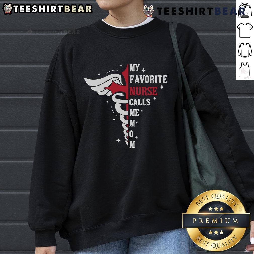 Premium My Favorite Nurse Calls Me Mom Caduceus Cross Nurse Mom Sweatshirt Premium My Favorite Nurse Calls Me Mom sweatshirt with caduceus design, perfect gift for nurse moms.