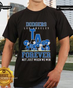 Premium Peanuts Charlie Brown Snoopy Dodgers Baseball T-Shirt celebrating loyalty, not just winning. Perfect for fans!