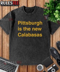Premium Pittsburgh Is The New Calabasas washed t-shirt displayed on a wooden background, showcasing trendy streetwear style.