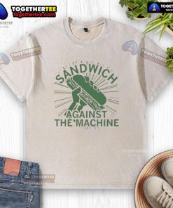 Premium sandwich against the machine washed t-shirt displayed on a wooden surface, showcasing its unique graphic design.