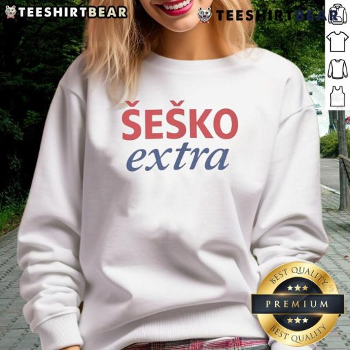 Alt Text: Premium Sesko Extra Manchester United Sweatshirt featuring club logo and stylish design for fans and athletes.