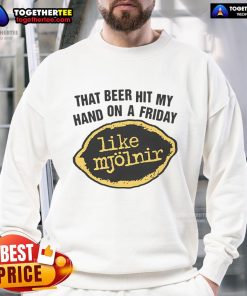 Premium sweatshirt featuring 'That Beer Hit My Hand On A Friday Like Mjolnir' graphic, perfect for casual outings.