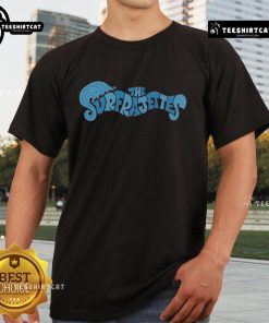 Alt Text: Premium The Surfrajettes Wave Logo T-Shirt featuring a stylish design and vibrant colors for surf music fans.