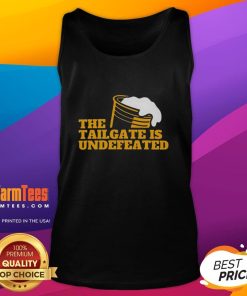 Premium 'The Tailgate Is Undefeated' logo tank top showcasing vibrant design, perfect for game day and casual wear.