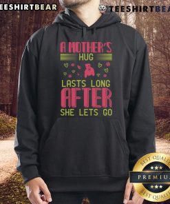 Cozy hoodie featuring 'A Mother's Hug Lasts Long After She Lets Go' design, perfect for expressing love and warmth.