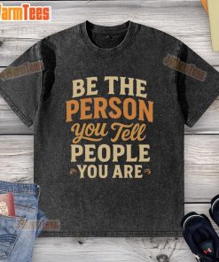 White washed t-shirt with 'Pretty Be The Person You Tell People You Are' printed in stylish typography.