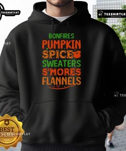 Cozy fall scene with bonfires, pumpkin spice, flannels, and hoodies, perfect for enjoying s'mores in autumn evenings.