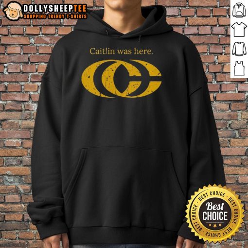 Caitlin Clark wearing a stylish CC logo hoodie, showcasing her unique fashion sense and love for basketball.